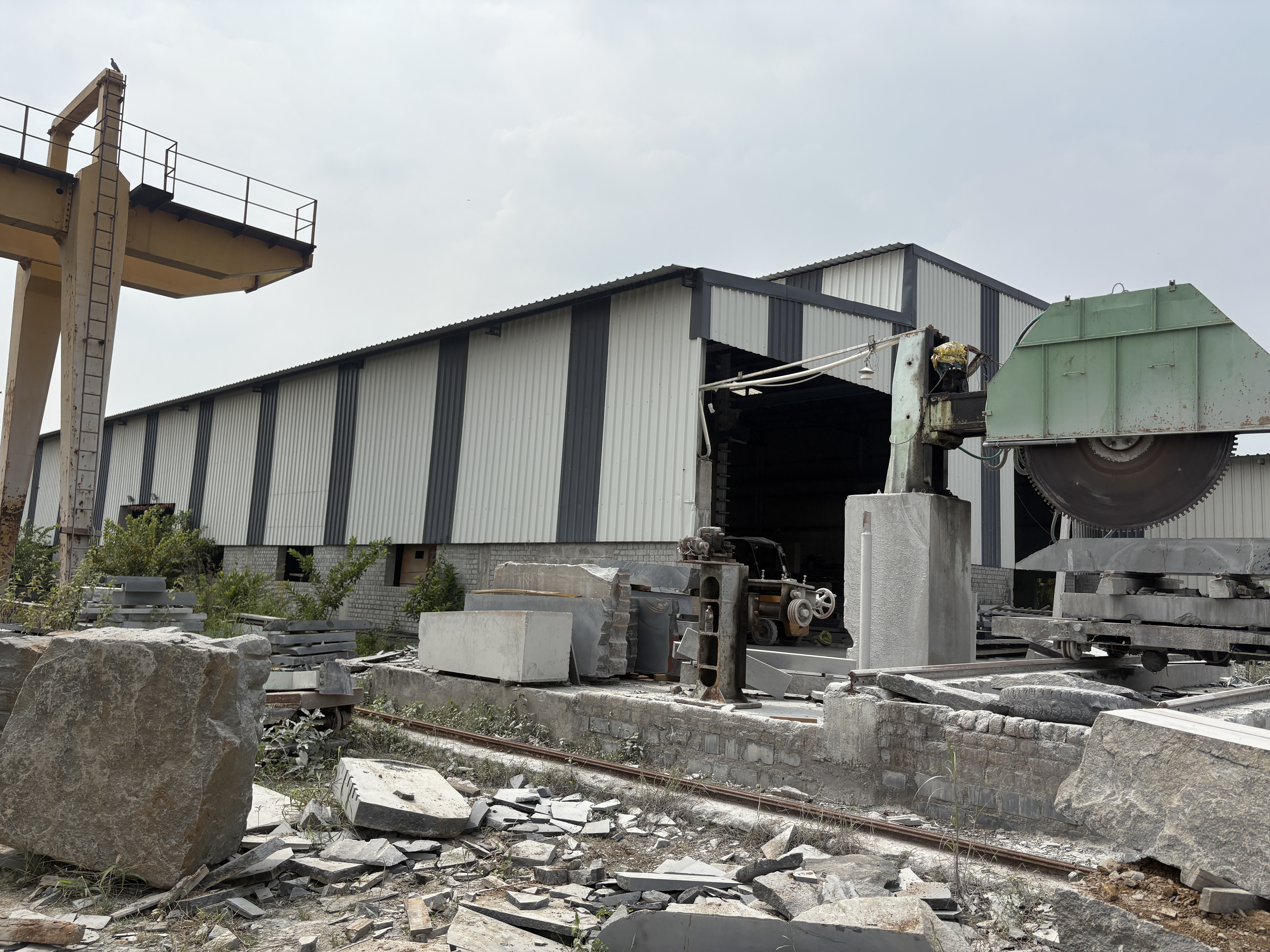 Factory exterior with cutting saw