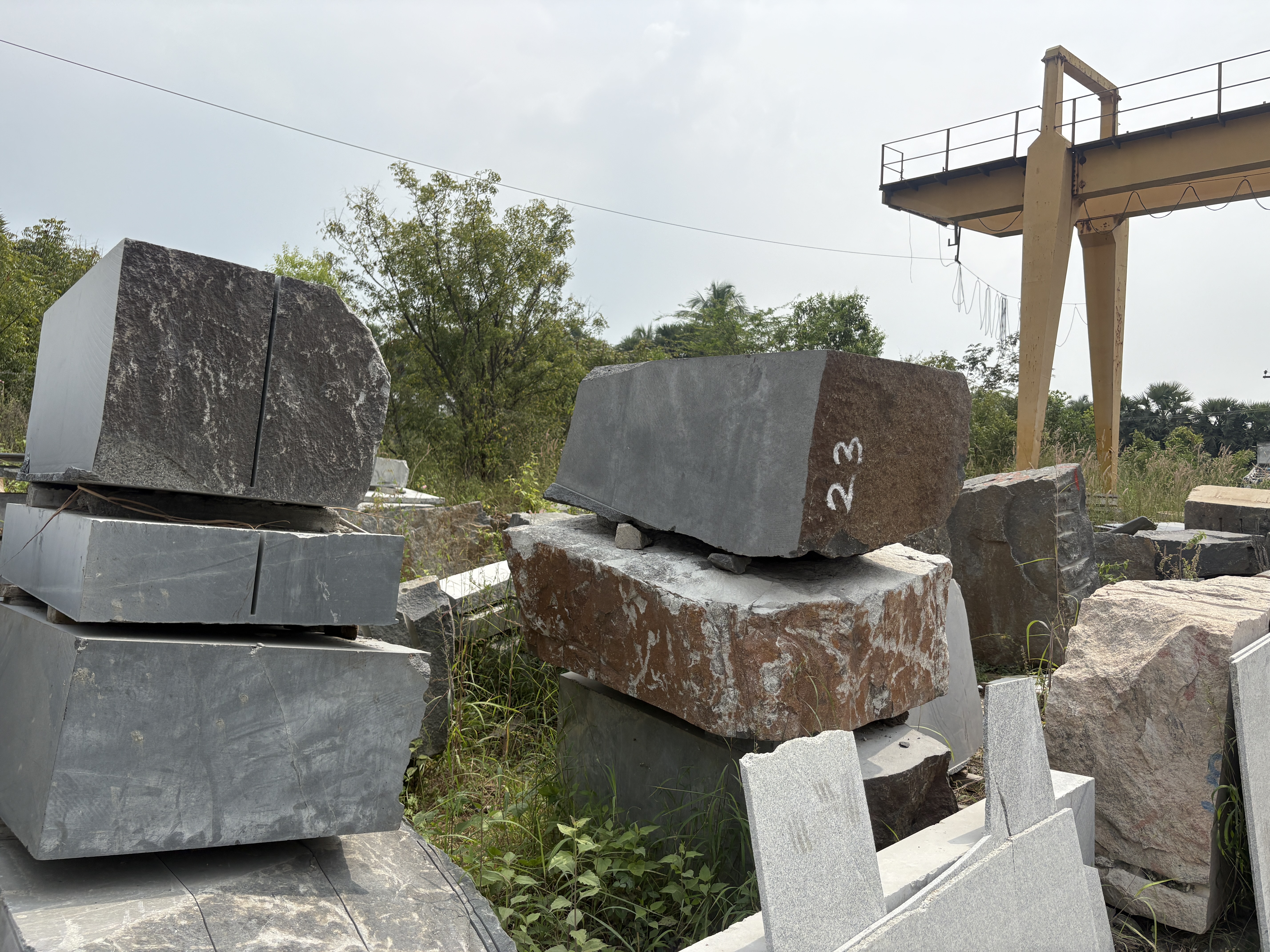Raw granite blocks in yard