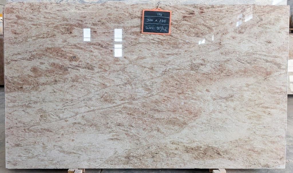Astoria granite slab — warm beige with rose veining