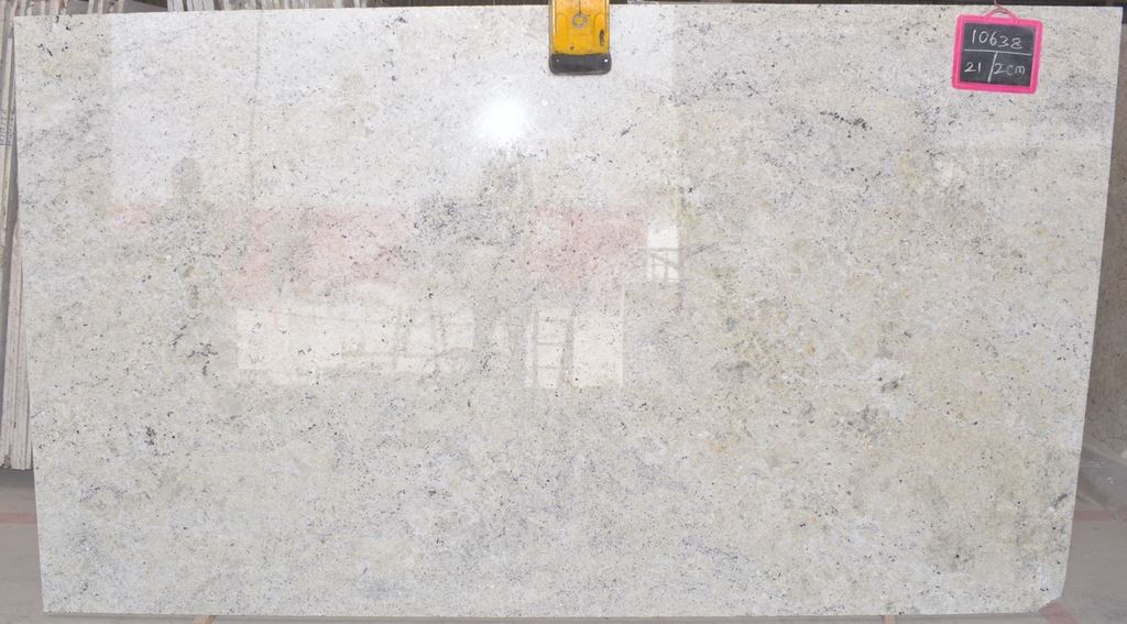 Colonial White granite slab — white with grey speckles