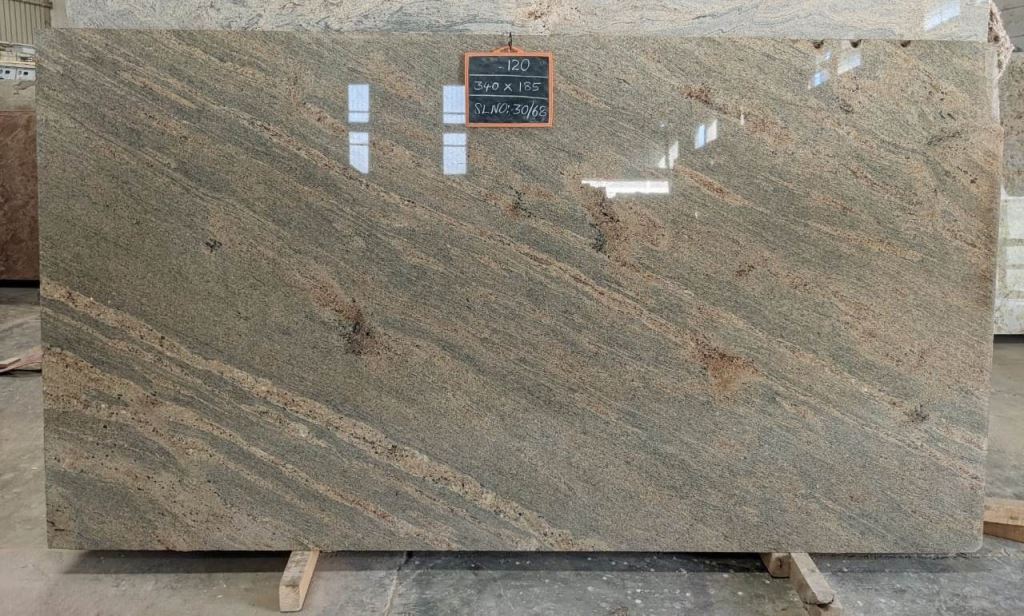 Kashmiri Gold granite slab — sandy gold with grey waves